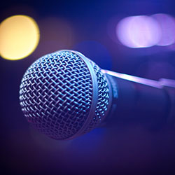 A karaoke mic ready for you to start your first song.